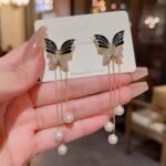 Stylize Your Look with LC Imitation's Korean Western Partywear Black Butterfly Earrings
